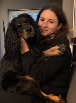 Georgiana holding Figo, her dog